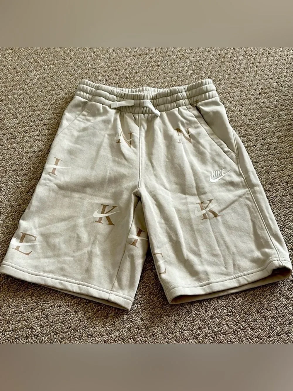 Nike boys shorts, cotton, tan with letters and checks, youth XL (14-16)
